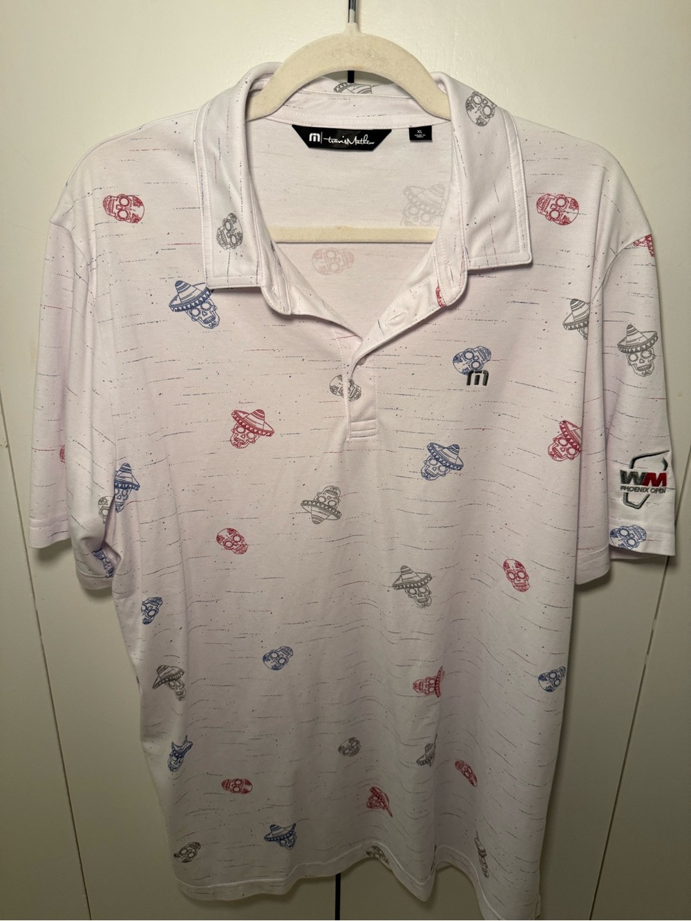 TravisMathew White Golf Polo with Red & Blue Skull - Waste Management